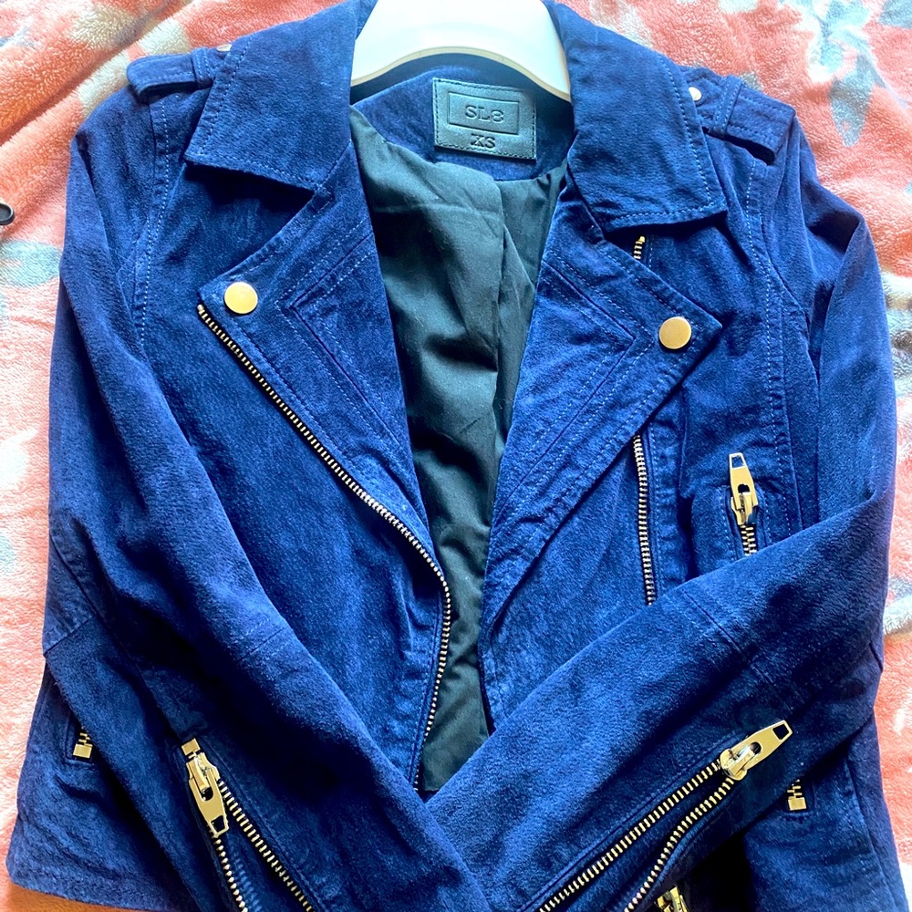 New but no tag. Never worn. Beautiful jacket to wear. Very fitted for slim body.
